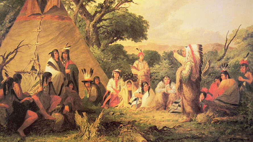 Indianie amerykańscy przy ognisku we wsi.